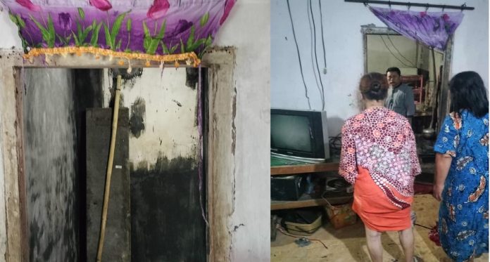 Warga melihat rumah yang terbakar akibat ledakan tabung elpiji di Desa Parijatah Kulon, Kecamatan Srono, Banyuwangi, Selasa (28/2/2023) pagi.