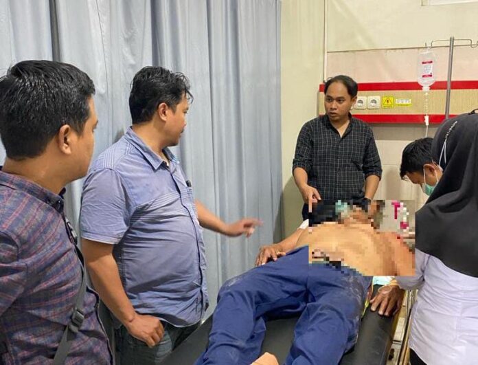 Ketua RT di Banyuwangi dibacok ketika melerai warganya. (foto/ist)